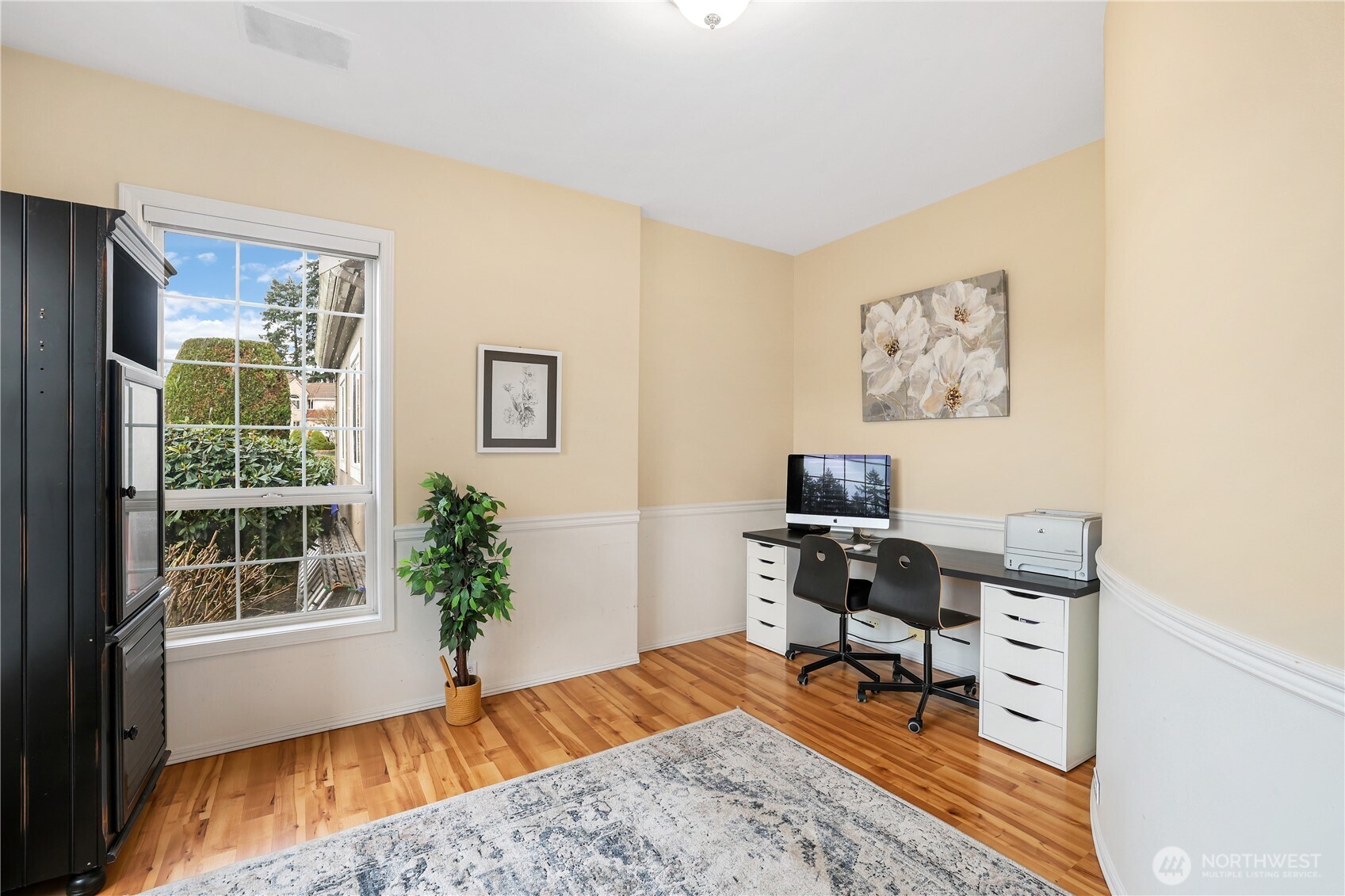423 Southwest 348th Court Federal Way, WA 98023 - Photo 16 of 39 a workspace with furniture and a window