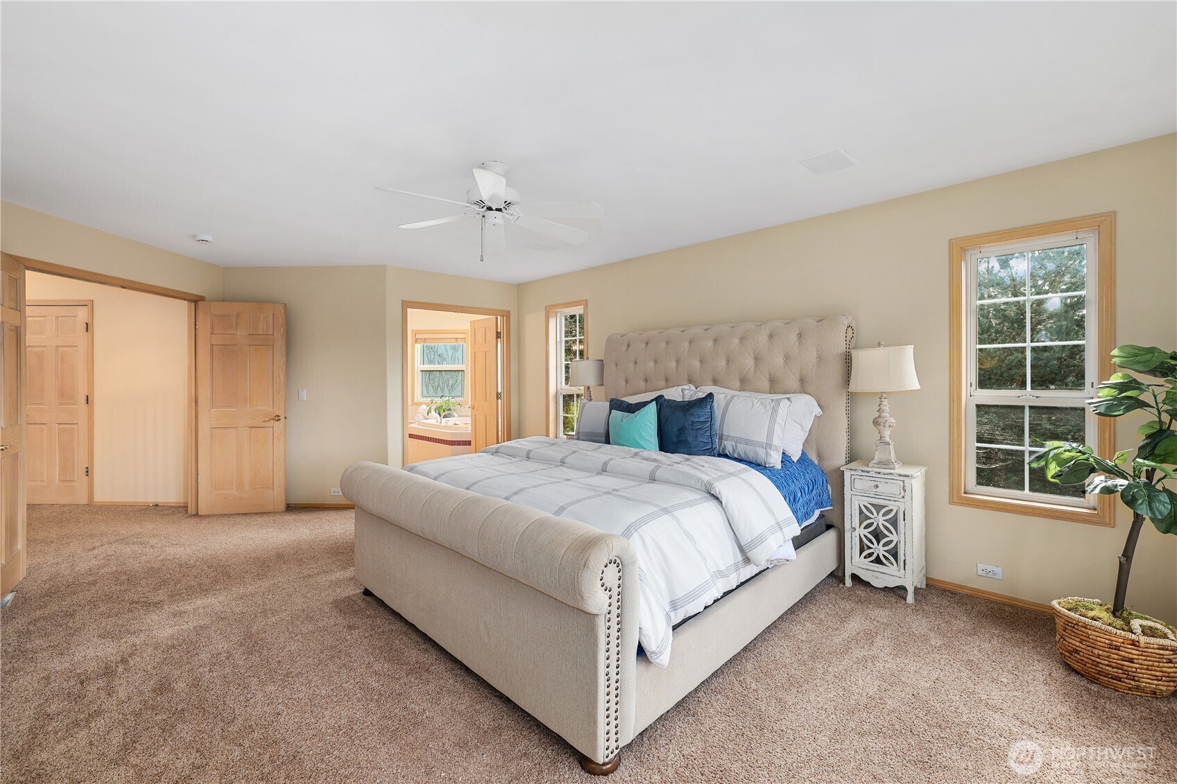 423 Southwest 348th Court Federal Way, WA 98023 - Photo 20 of 39 a spacious bedroom with a bed and a window