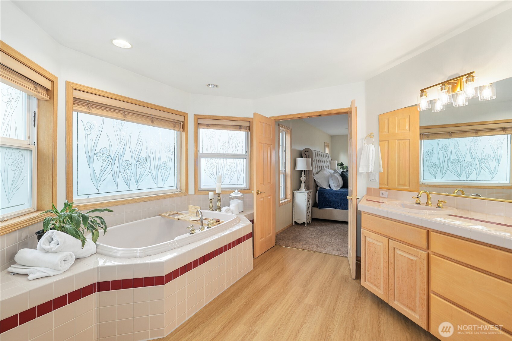 423 Southwest 348th Court Federal Way, WA 98023 - Photo 21 of 39 a spacious bathroom with a granite countertop tub sink and mirror