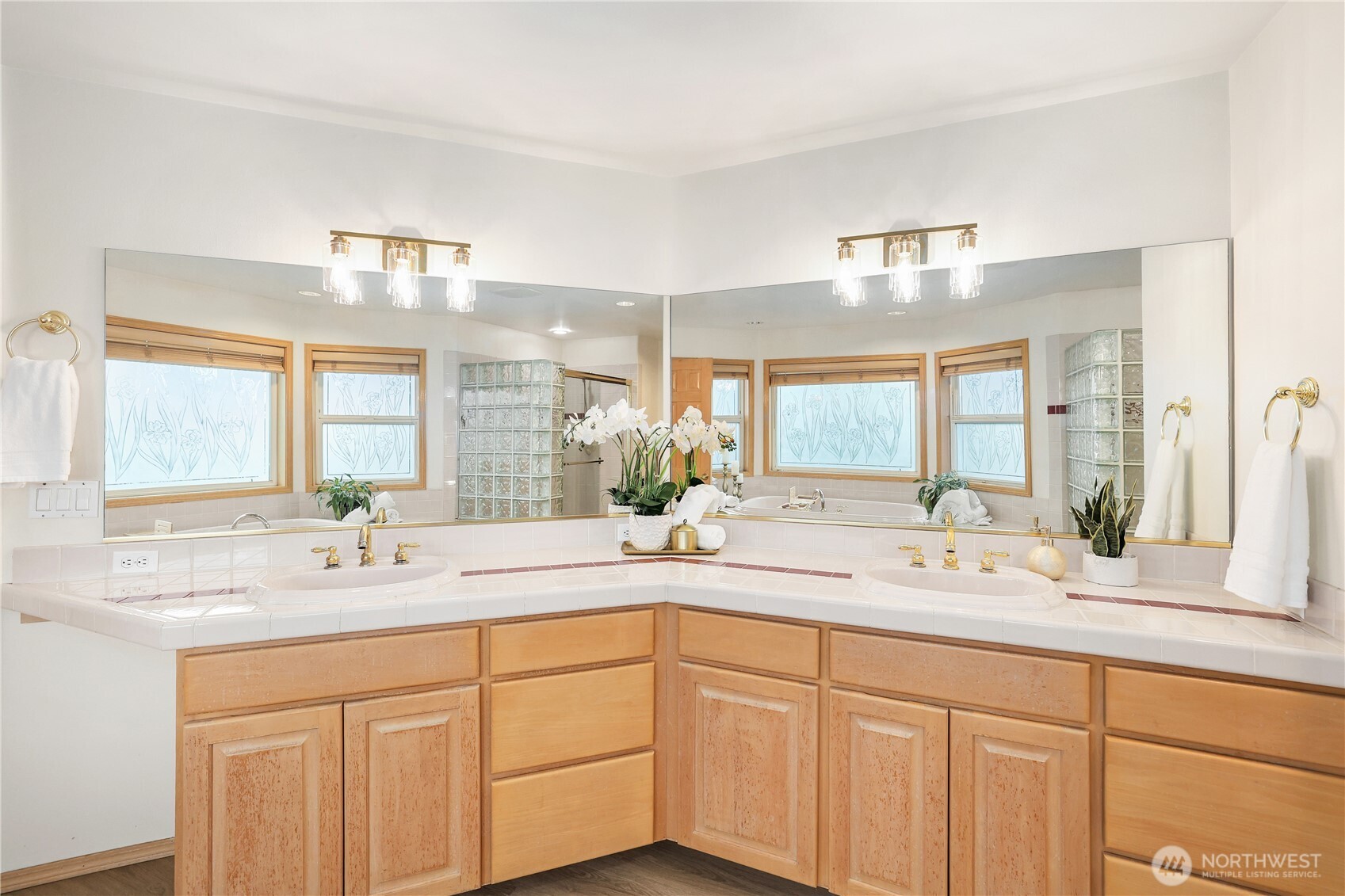 423 Southwest 348th Court Federal Way, WA 98023 - Photo 22 of 39 a bathroom with a sink and a mirror