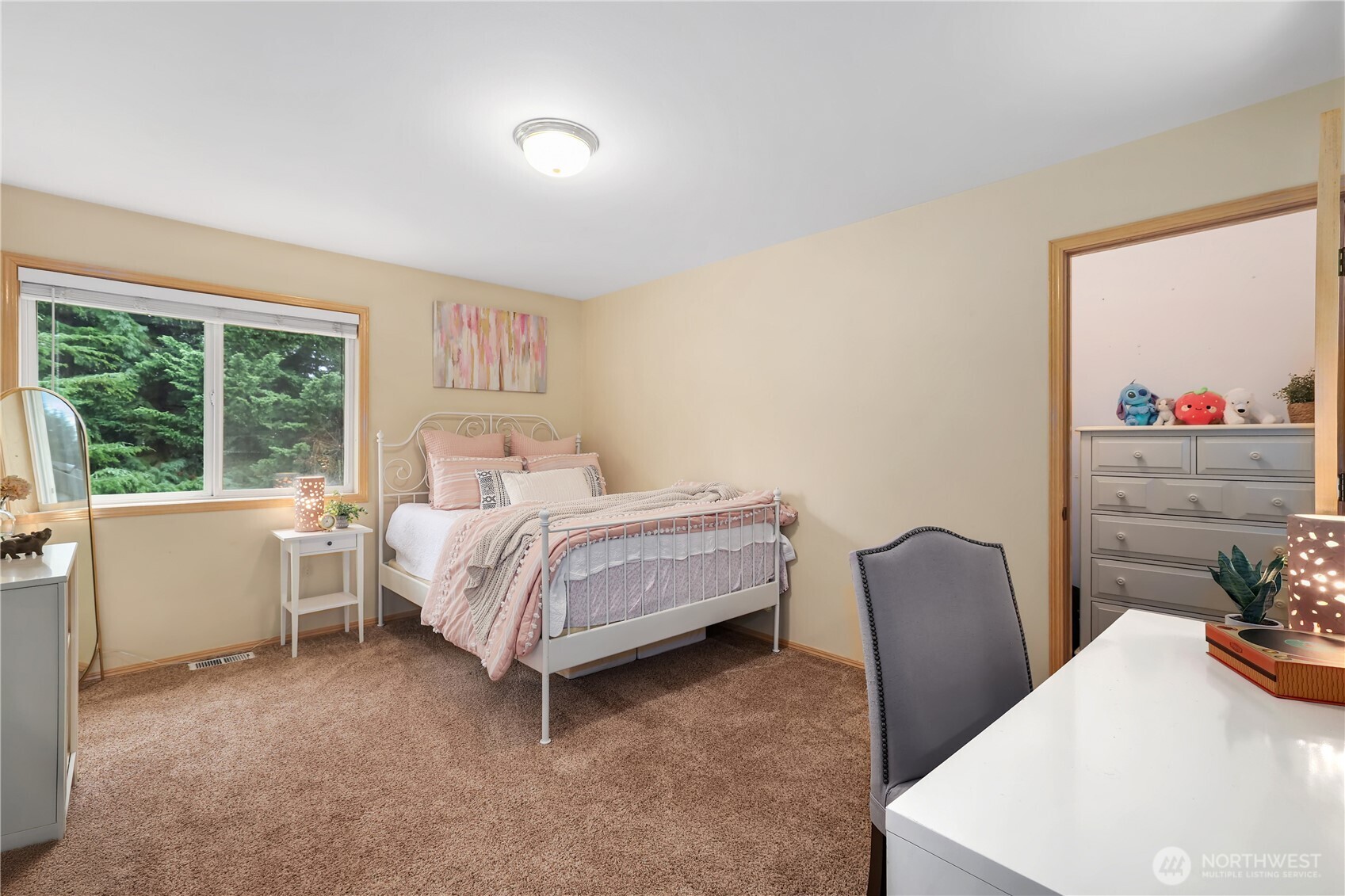 423 Southwest 348th Court Federal Way, WA 98023 - Photo 24 of 39 a bedroom with a bed and a table