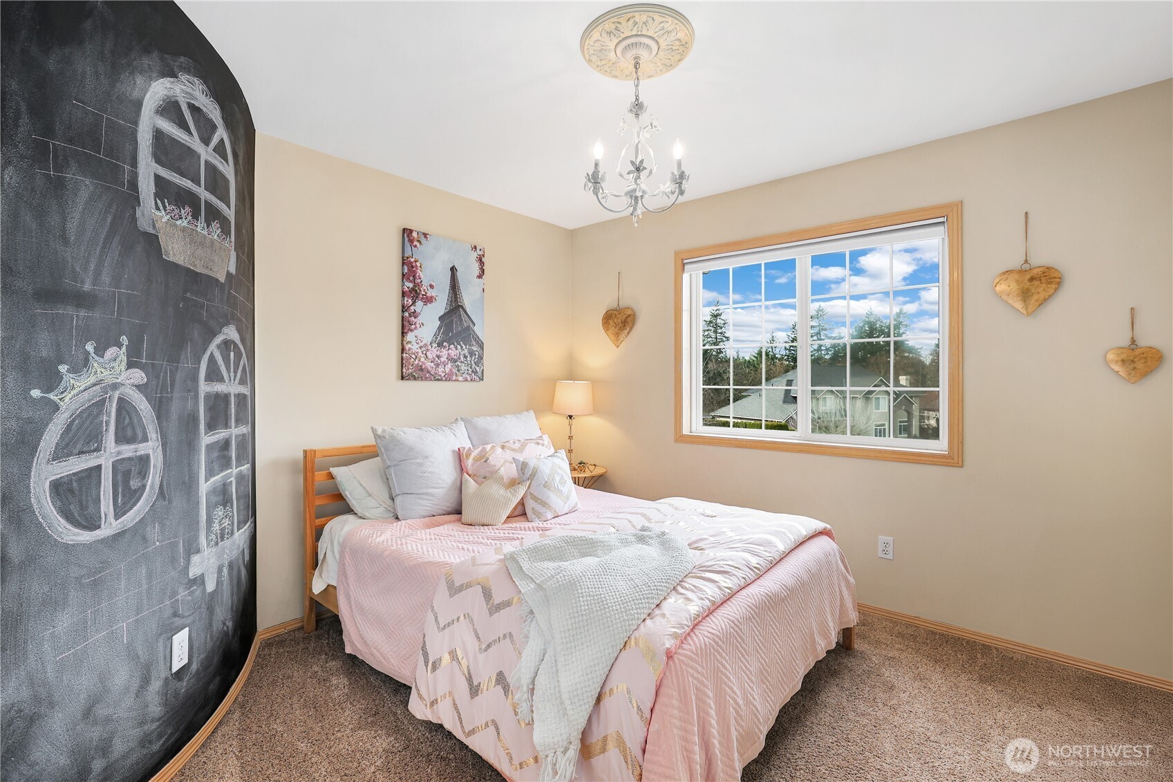 423 Southwest 348th Court Federal Way, WA 98023 - Photo 27 of 39 a bedroom with a bed and a window