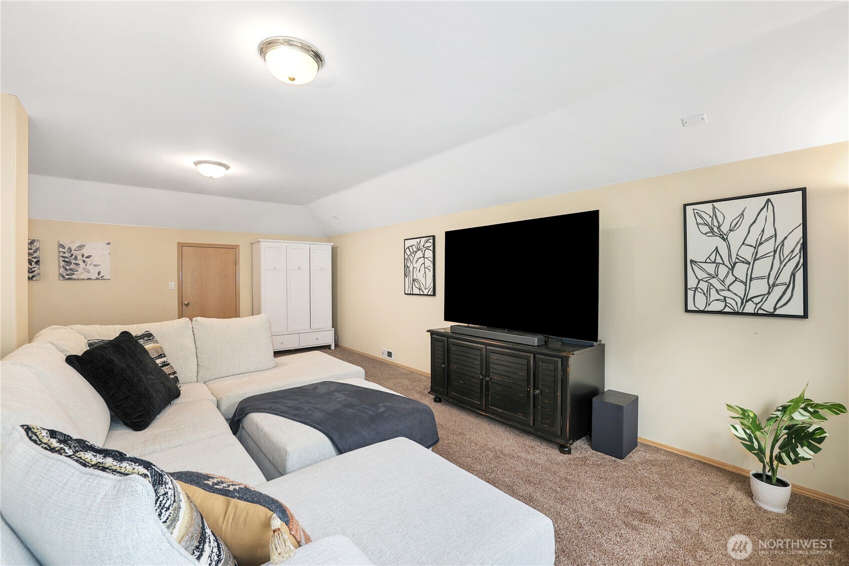 423 Southwest 348th Court Federal Way, WA 98023 - Photo 29 of 39 a living room with furniture and a flat screen tv