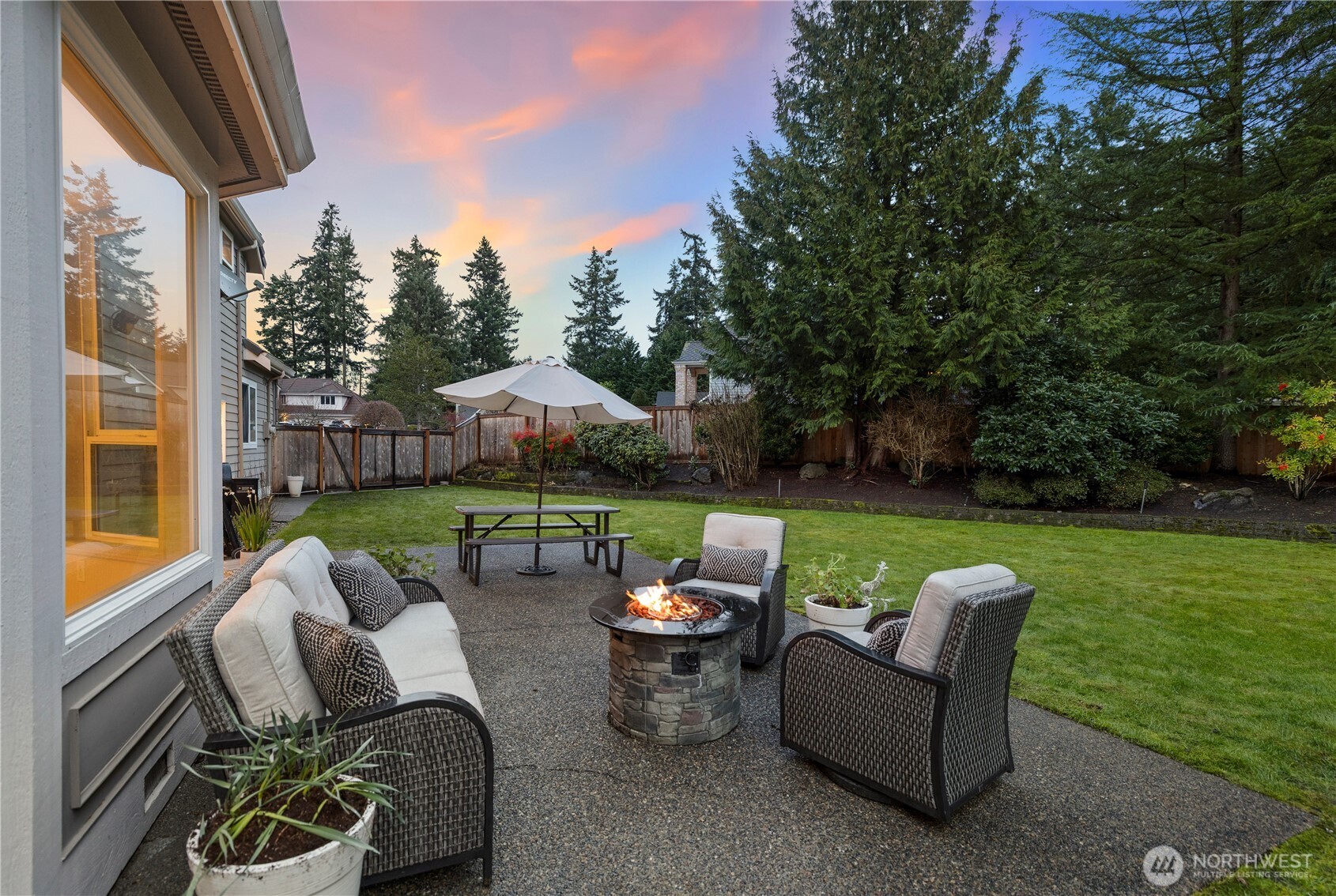 423 Southwest 348th Court Federal Way, WA 98023 - Photo 32 of 39 a view of a patio with couches chairs and a yard