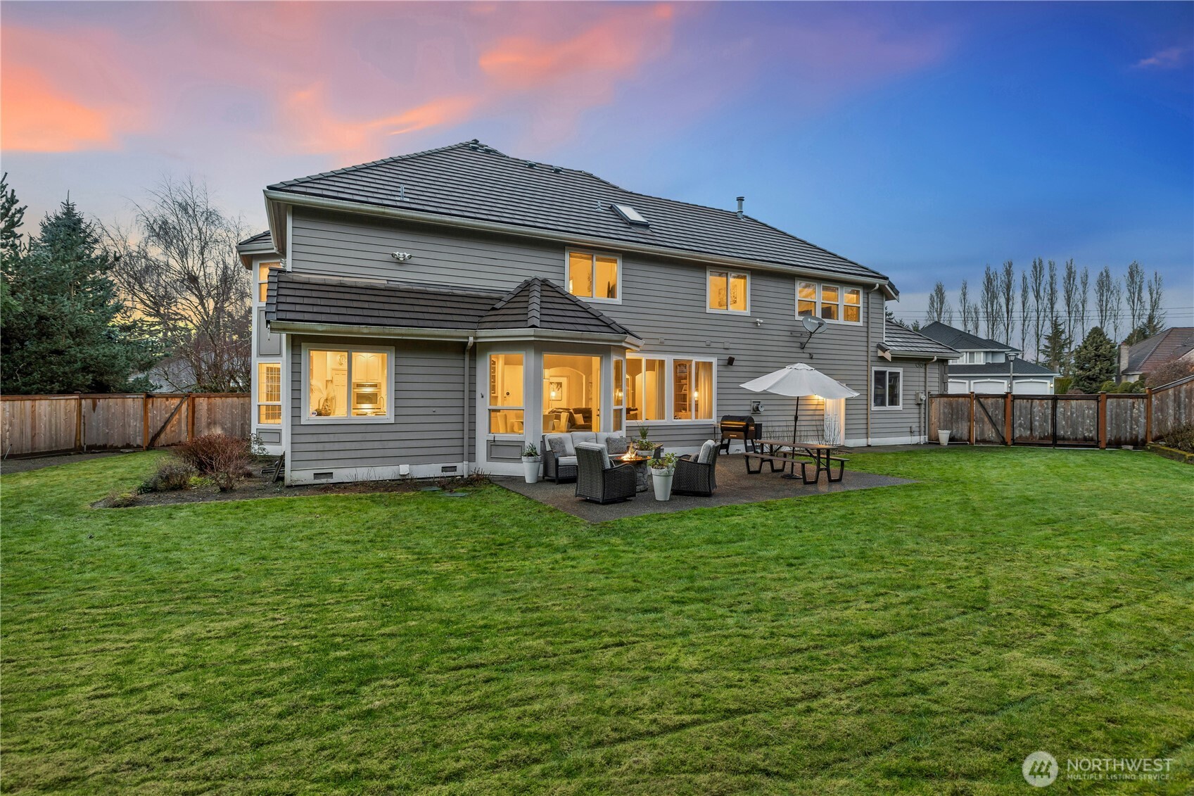 423 Southwest 348th Court Federal Way, WA 98023 - Photo 33 of 39 a view of a house with a big yard and large trees