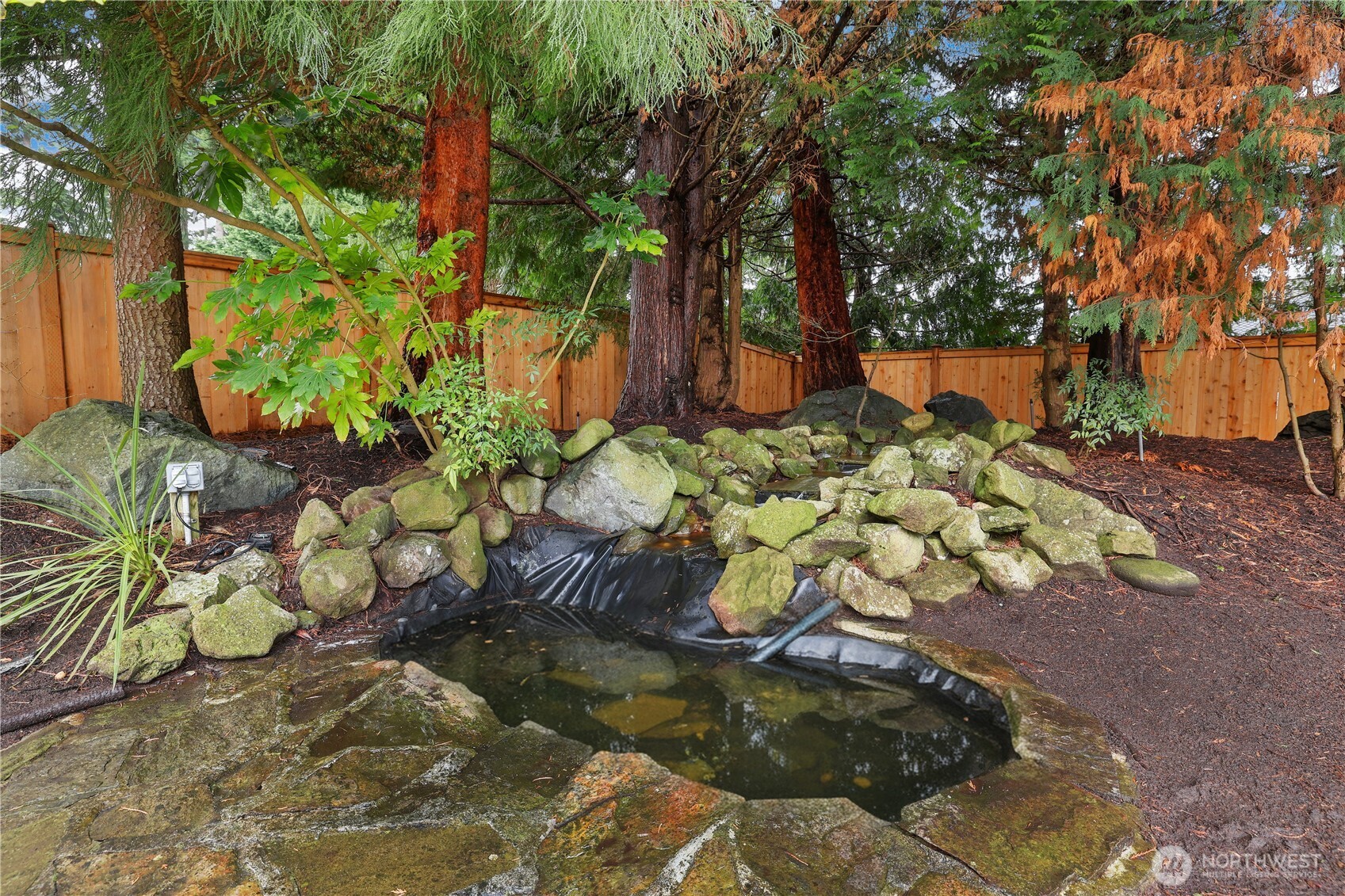423 Southwest 348th Court Federal Way, WA 98023 - Photo 35 of 39 a white vase with flowers
