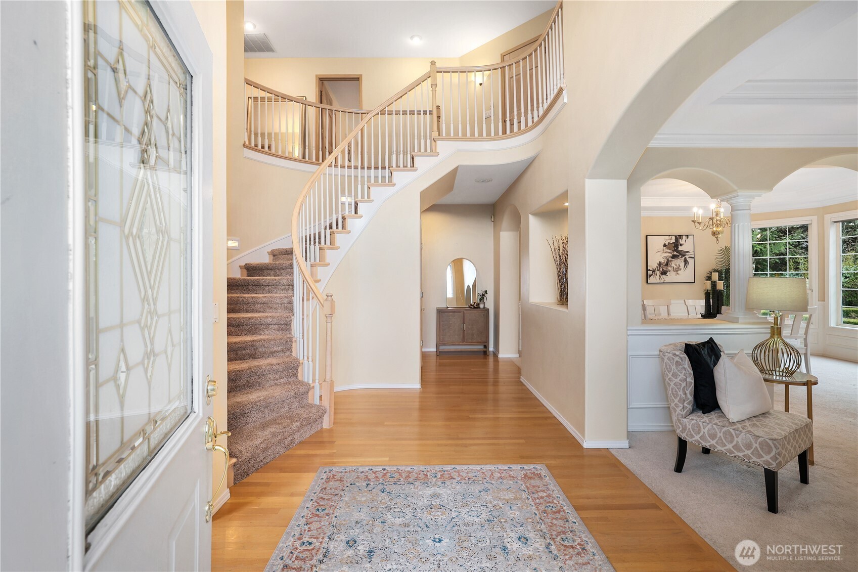 423 Southwest 348th Court Federal Way, WA 98023 - Photo 5 of 39 a view of entryway and hall with wooden floor