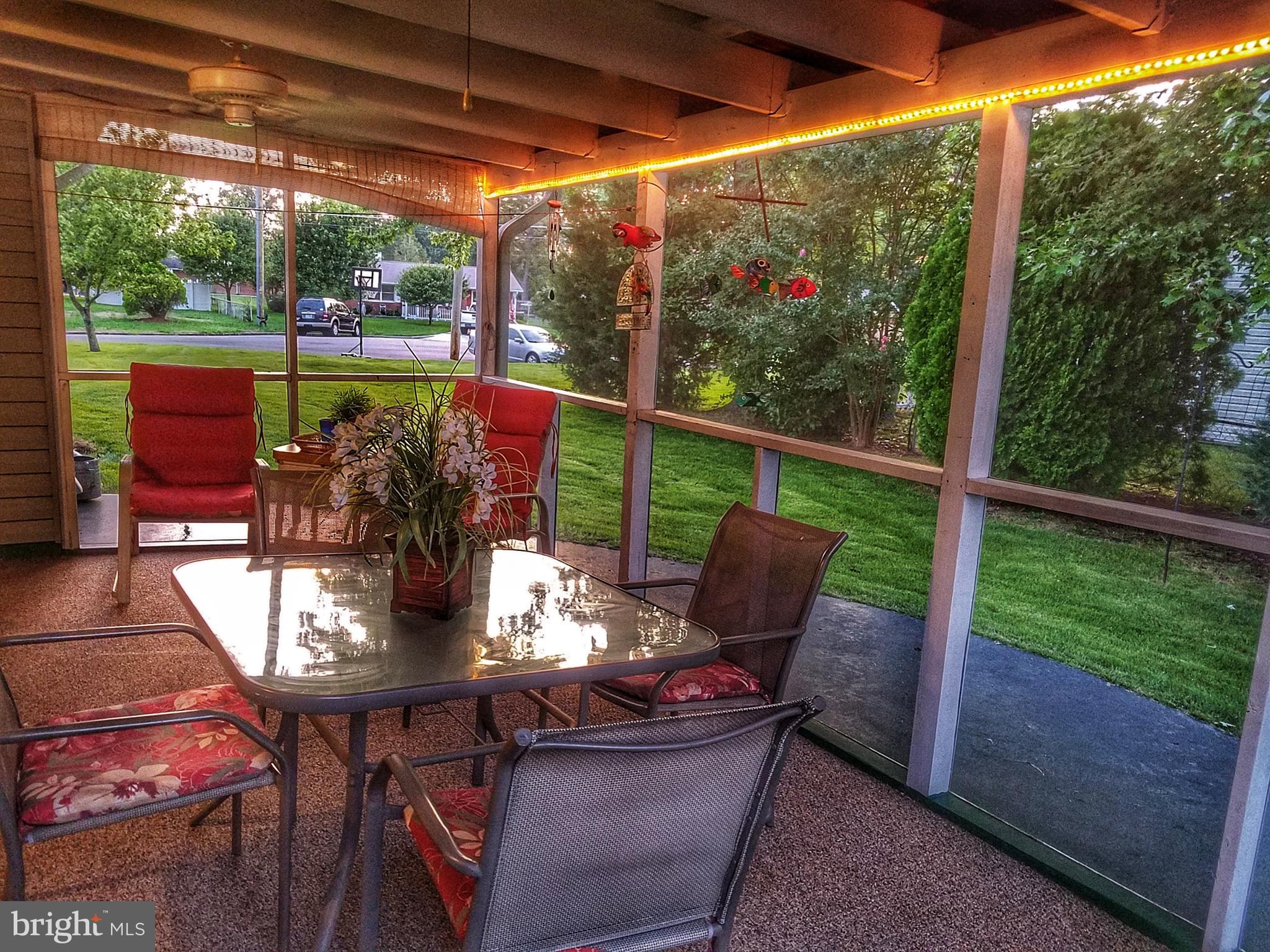 4604 Roundhill Road Alexandria, VA 22310 - Photo 33 of 40 Screened-in porch at dusk