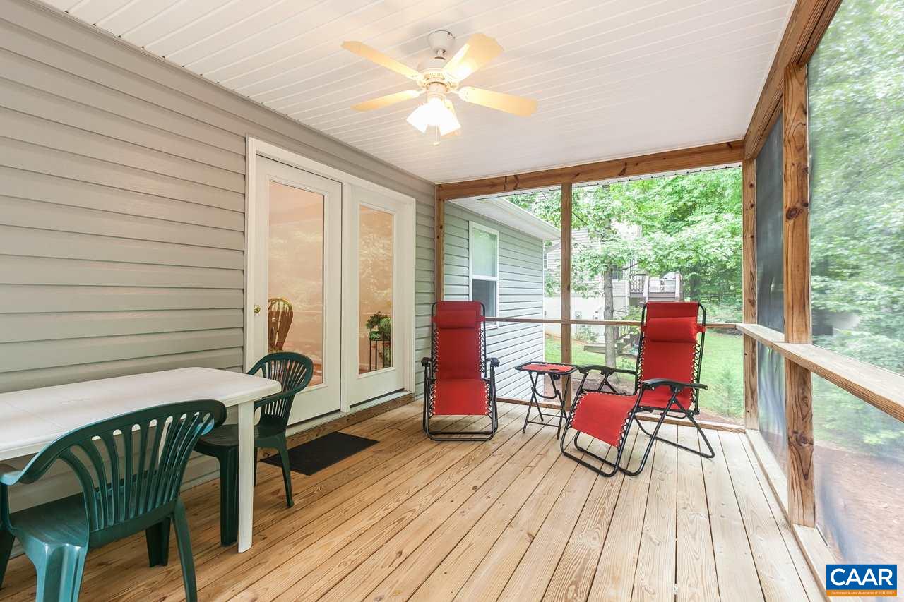 9 Stonewall Road Palmyra, VA 22963 - Photo 24 of 36 a balcony with furniture and wooden floor