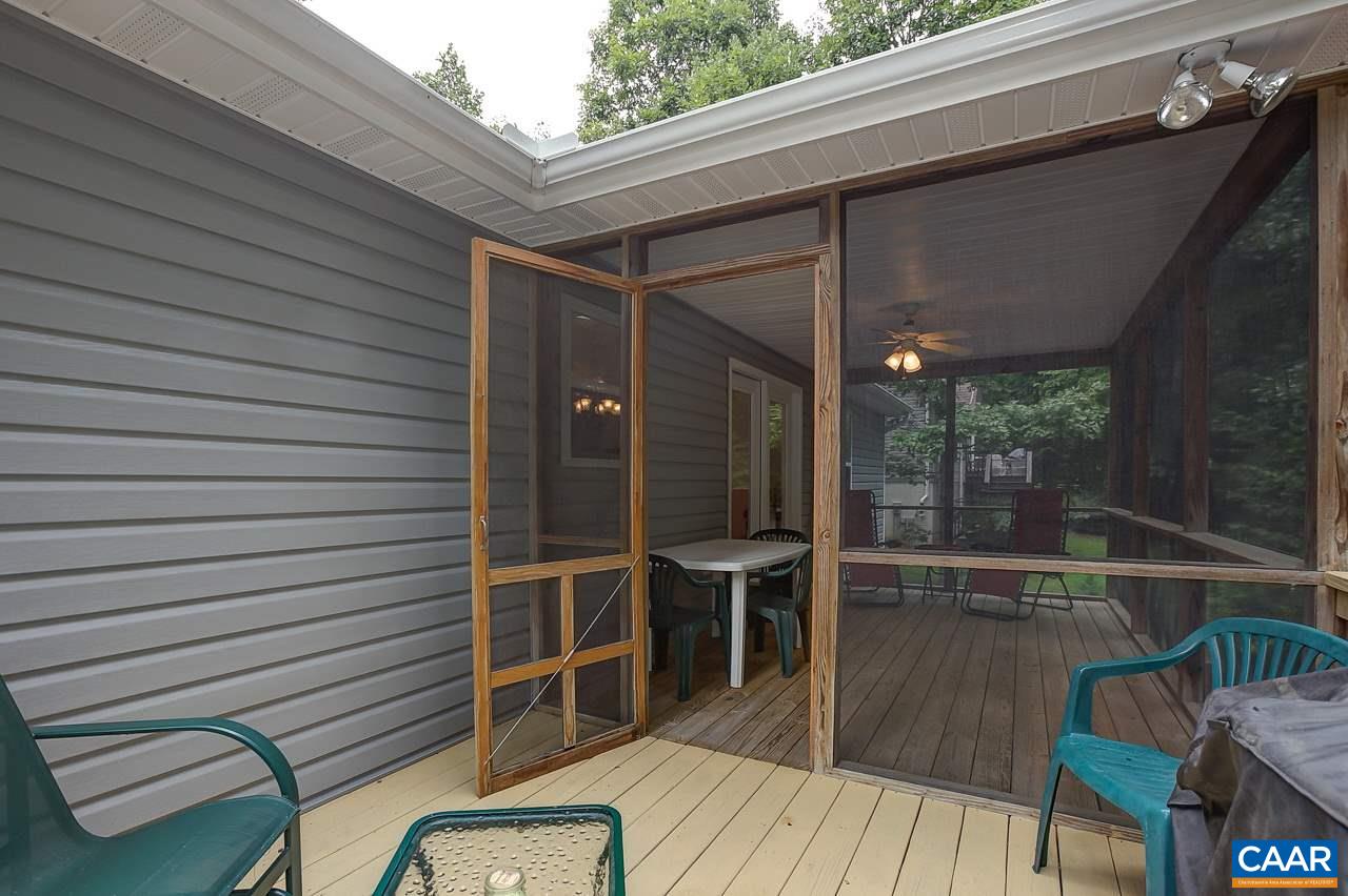 9 Stonewall Road Palmyra, VA 22963 - Photo 25 of 36 a backyard of a house with wooden floor and outdoor seating