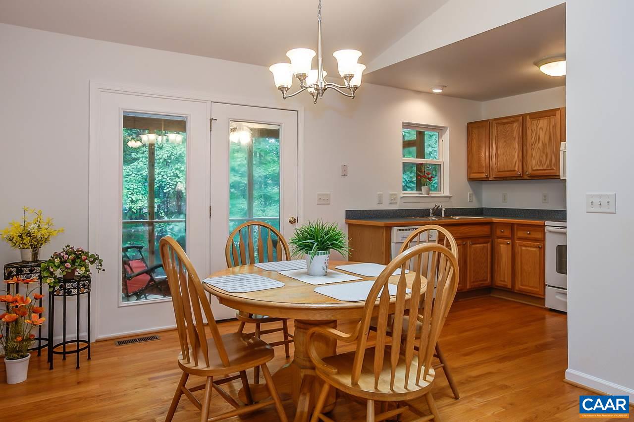 9 Stonewall Road Palmyra, VA 22963 - Photo 5 of 36 a view of a dining room with furniture window and wooden floor