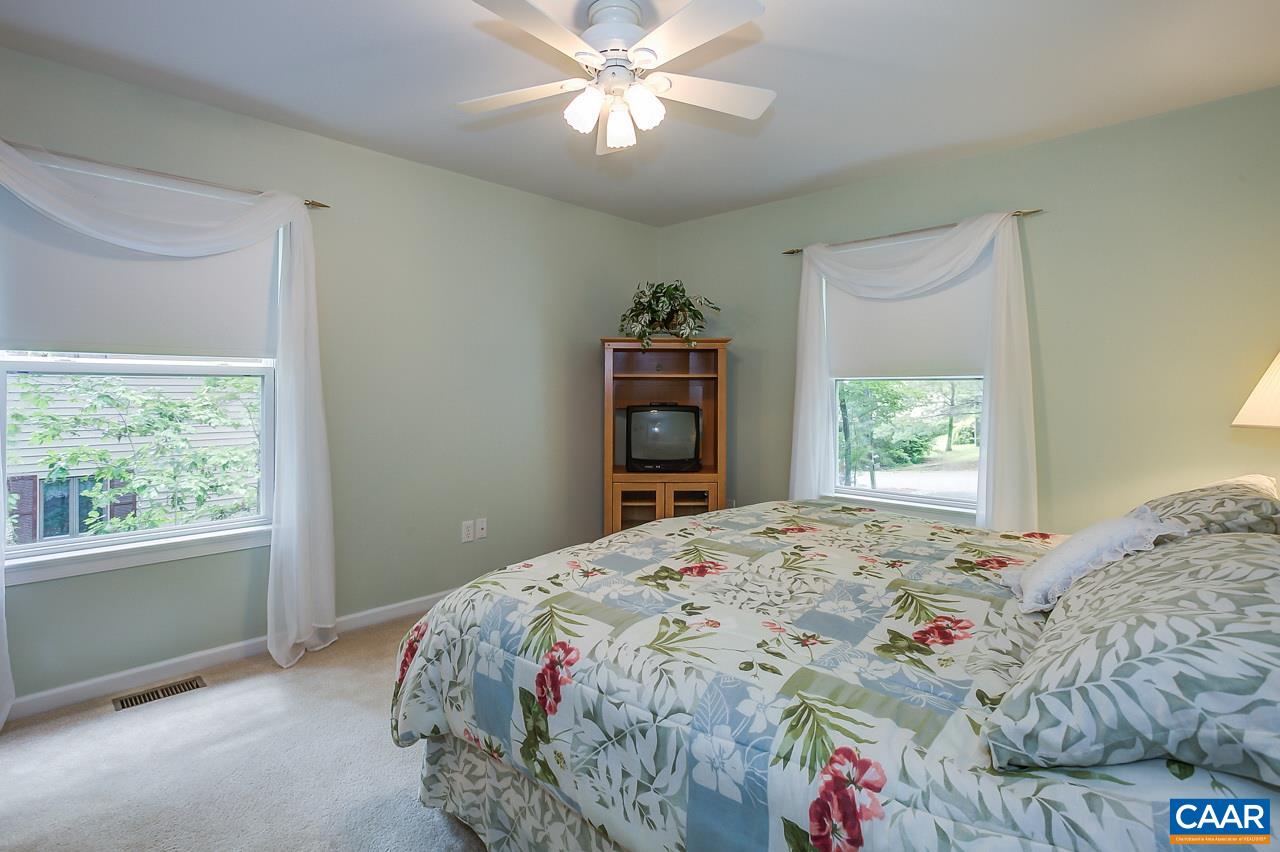 9 Stonewall Road Palmyra, VA 22963 - Photo 8 of 36 a bedroom with a bed and a window