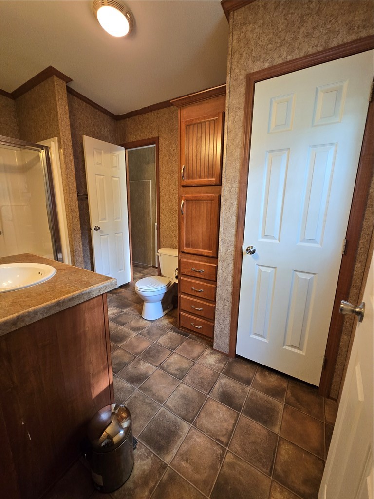 5337 State Rte 26 Triangle, NY 13862 - Photo 11 of 22 A classic bedroom features comfortable carpeting, wood trim details, and natural window lighting.