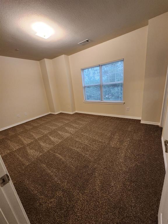 5516 Del Rey Drive Denton, TX 76208 - Photo 11 of 16 a view of an empty room with a window