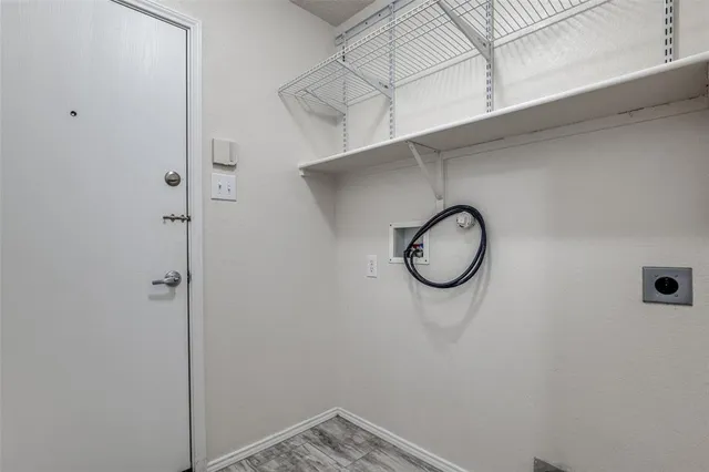 a very nice looking hallway with a wooden floor