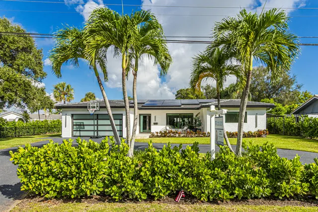 front view of a house with a small yard