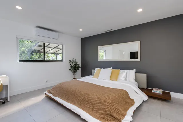 a view of a storage and utility room with washer and dryer