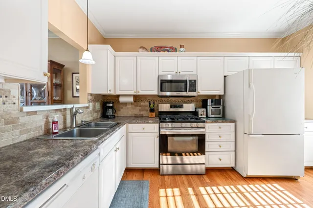 $315,000 | 8221 Hempshire Place, Unit 106, Raleigh, NC 27613