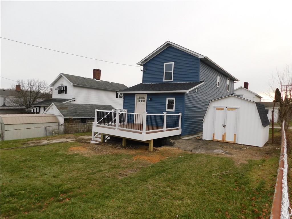 408 3rd Street Allison, PA 15413 - Photo 4 of 40 a view of a house with a yard