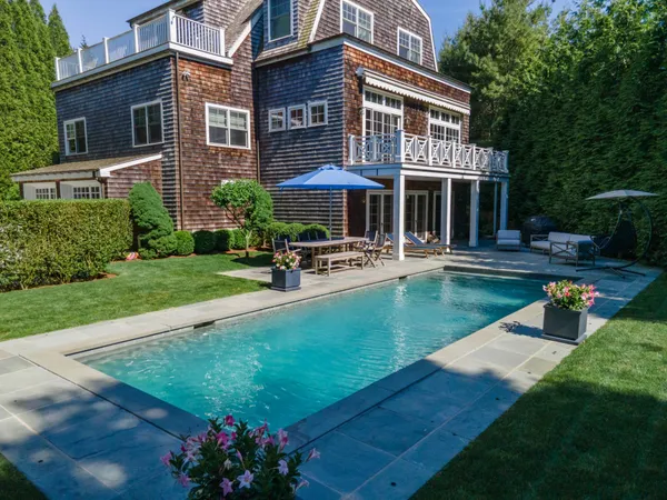 a view of a garden with a tree