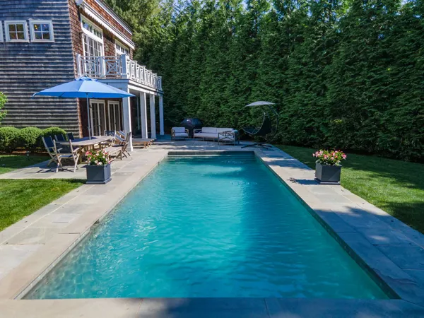 a view of a back yard of the house