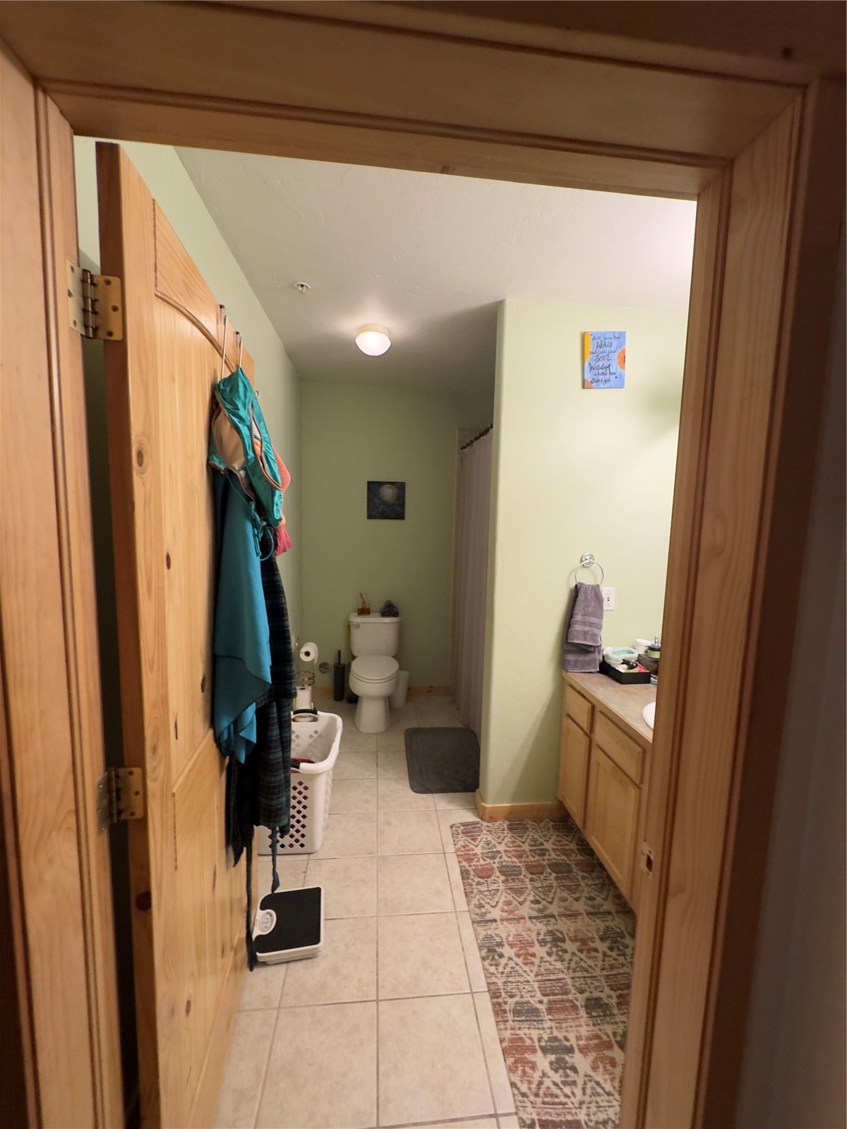 337 Streamside Lane, Unit 104 Frisco, CO 80443 - Photo 9 of 10 a bathroom with a sink and toilet