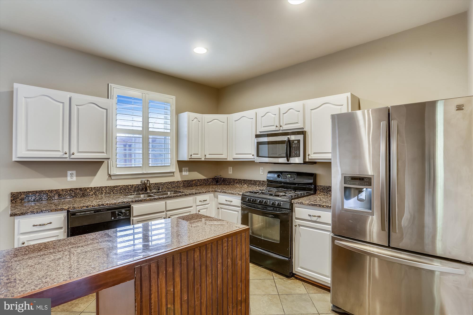 13365 Rushing Water Way Germantown, MD 20874 - Photo 6 of 36 Kitchen with granite, stainless, and useful island