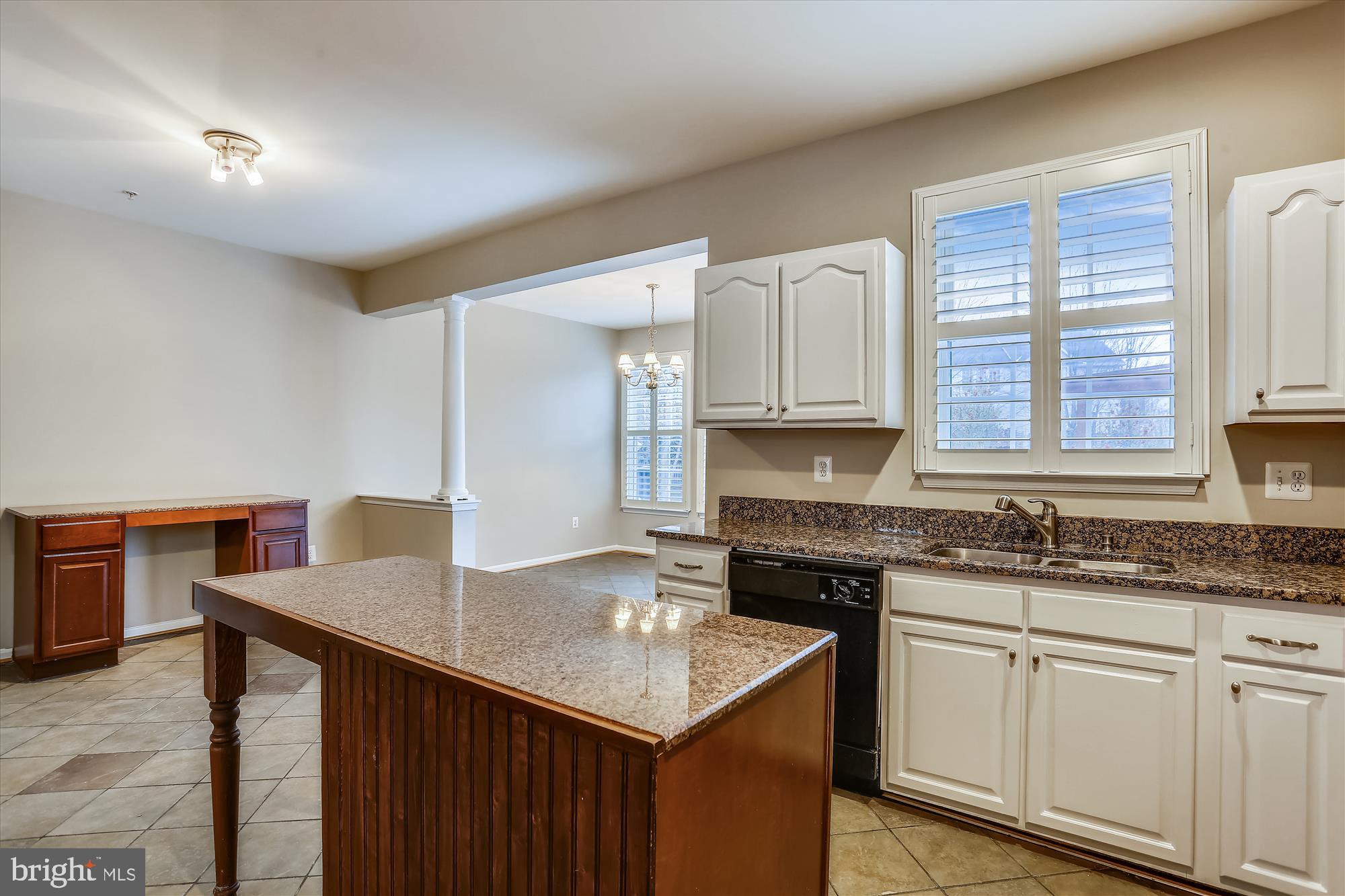 13365 Rushing Water Way Germantown, MD 20874 - Photo 7 of 36 Kitchen island, desk on far wall