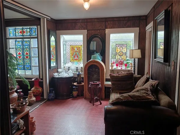 a room with furniture and a window