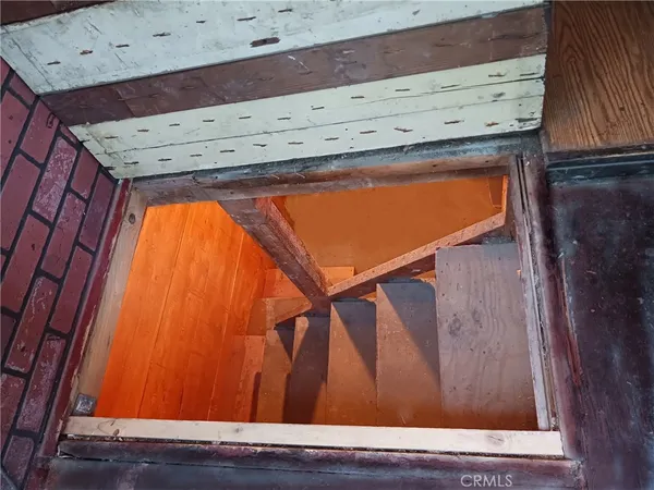 wooden floor with glass top door
