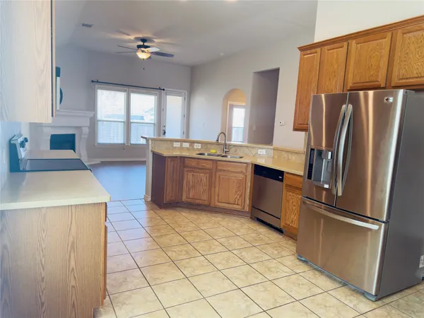 a house view with a backyard space