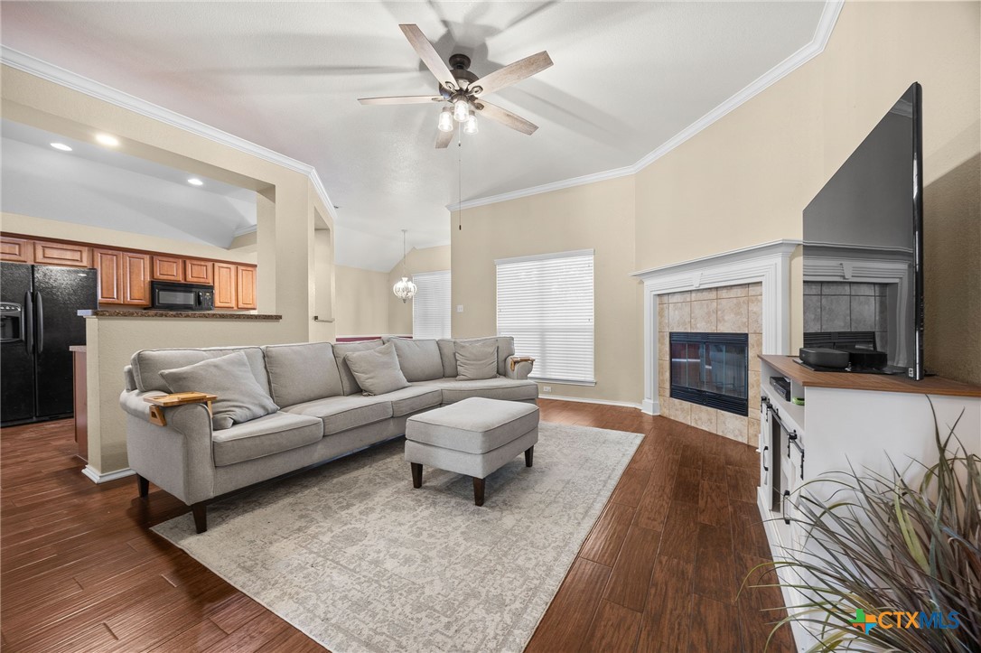 910 Neuberry Cliffe Temple, TX 76502 - Photo 6 of 32 a living room with furniture and a fireplace