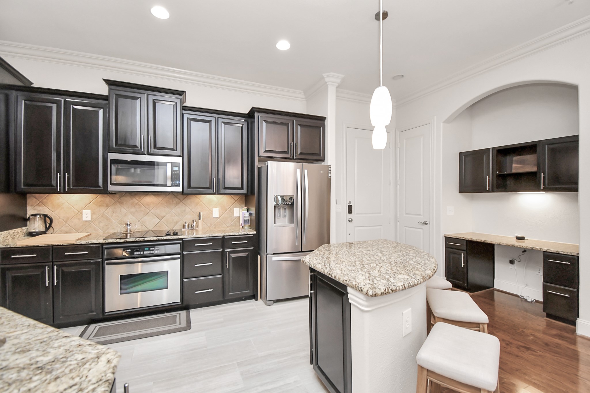 2120 Kipling Street, Unit 306 Houston, TX 77098 - Photo 6 of 31 Kitchen island