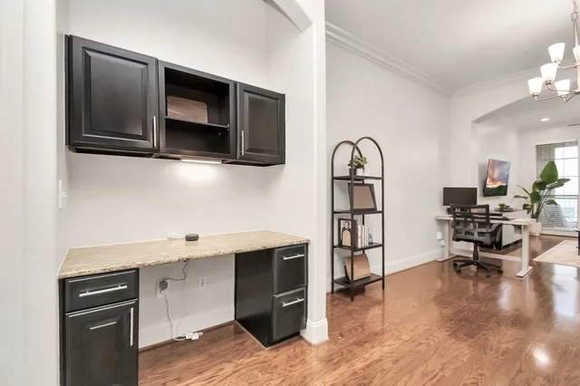 a view of living room with furniture and flat screen tv