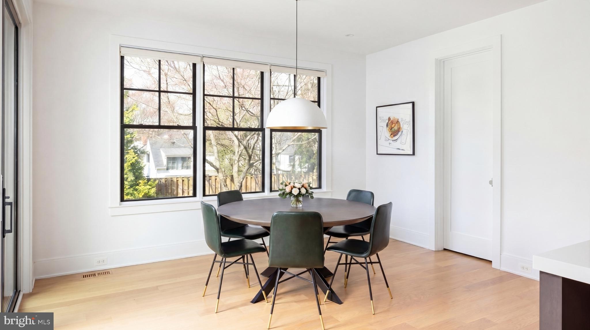 7208 Ridgewood Avenue Chevy Chase, MD 20815 - Photo 15 of 50 a dining room with furniture and window