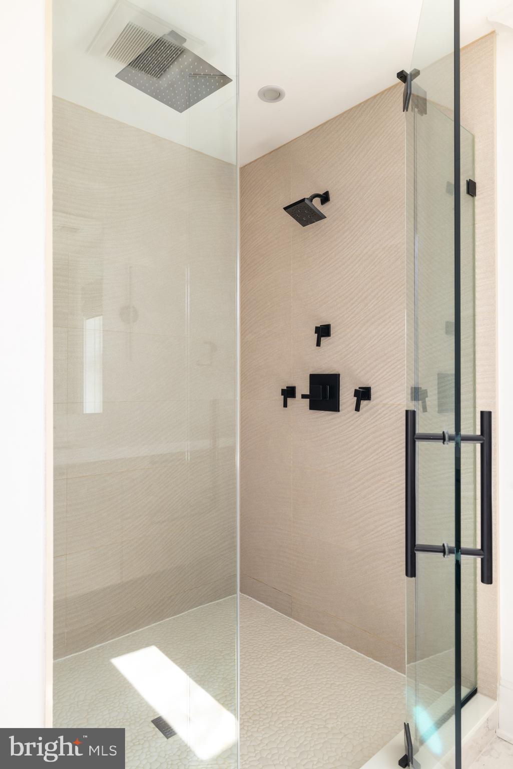 7208 Ridgewood Avenue Chevy Chase, MD 20815 - Photo 33 of 50 a bathroom with a shower