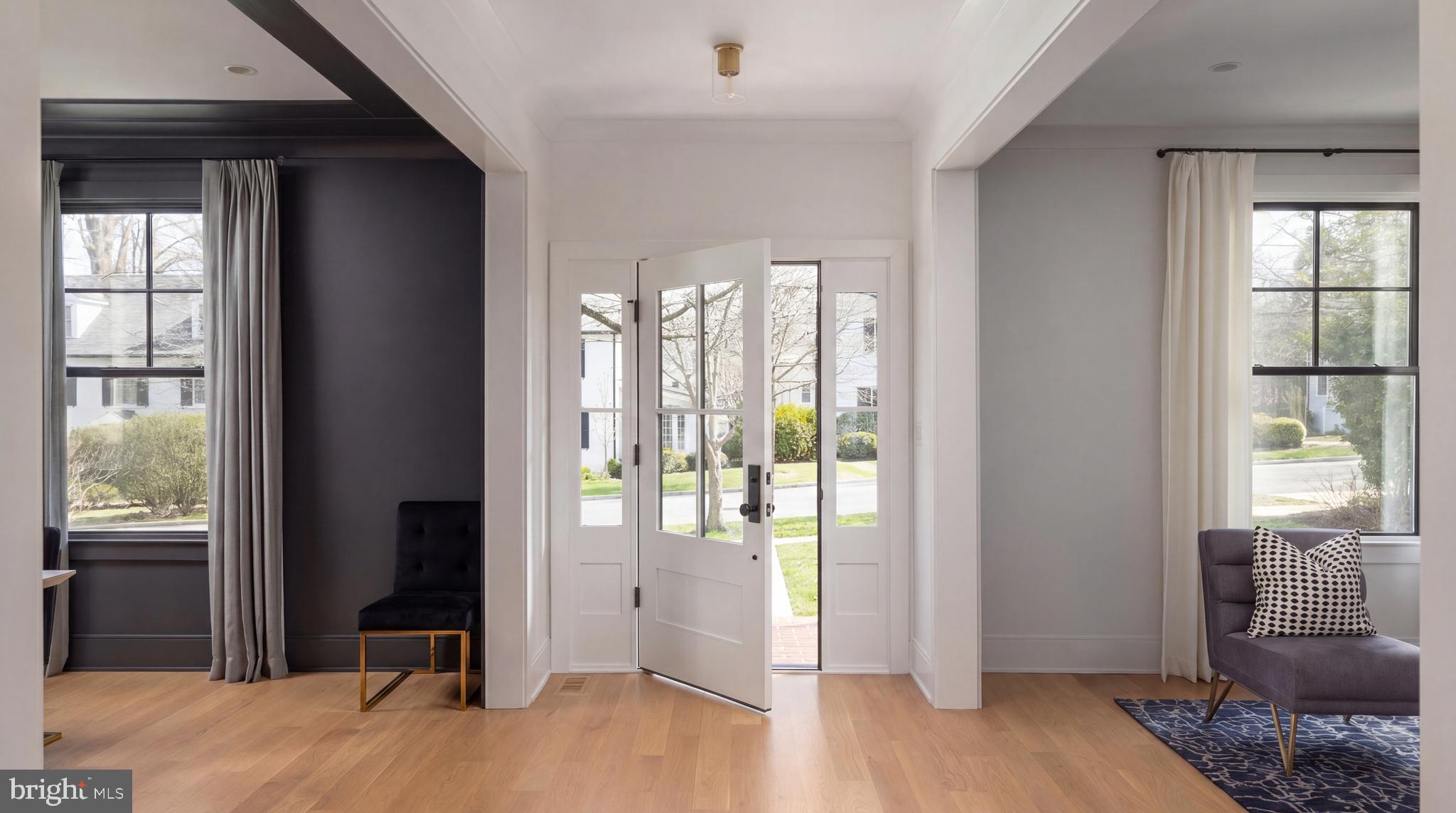 7208 Ridgewood Avenue Chevy Chase, MD 20815 - Photo 4 of 50 a view of entryway with wooden floor and bedroom