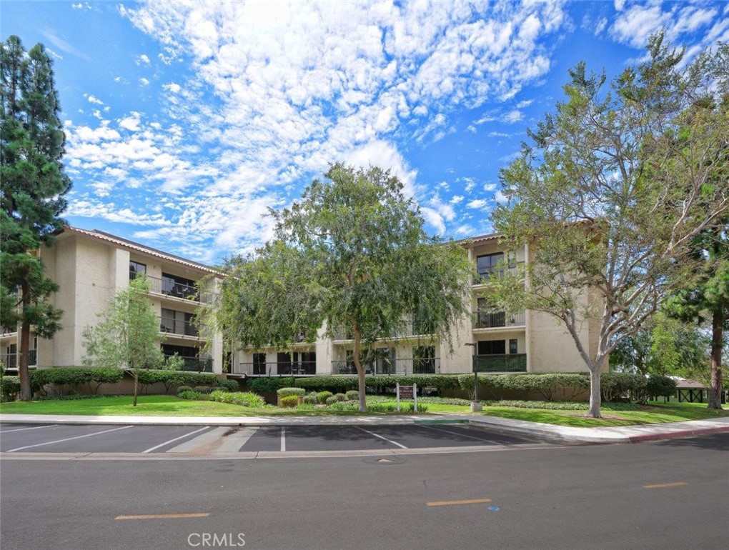 a view of a house with a street