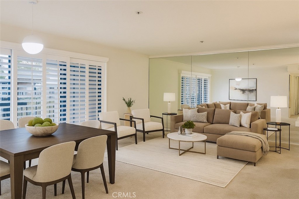 13601 Del Monte Drive, Unit 75 Seal Beach, CA 90740 - Photo 12 of 28 a living room with furniture and a potted plant