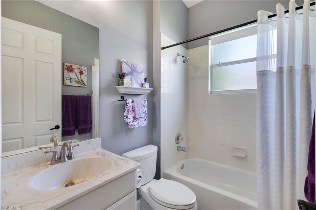 3232 Sundance Circle Naples, FL 34109 - Photo 24 of 50 a bathroom with a sink toilet and shower