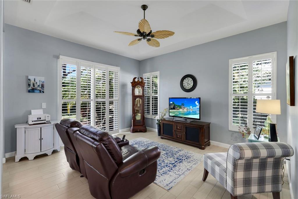 3232 Sundance Circle Naples, FL 34109 - Photo 5 of 50 a living room with furniture