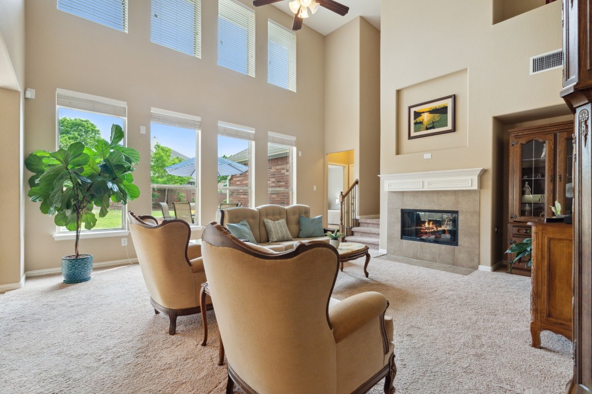 Soaring ceilings and double decker windows allow for ample natural light to show off this beautiful home!