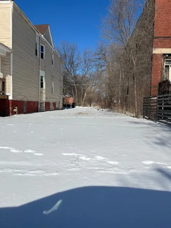 a view of road with large building