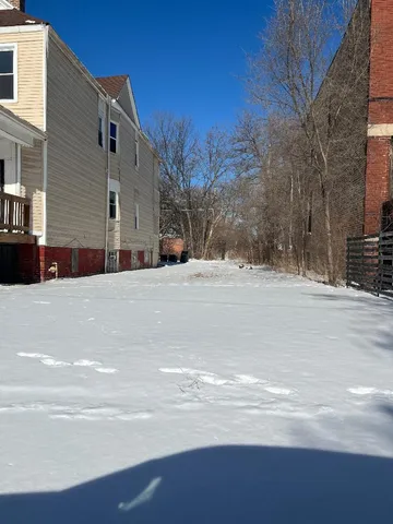 a view of road with large building