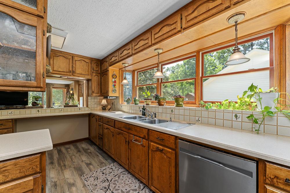 2915 Ashford Road Northeast Brookhaven, GA 30319 - Photo 28 of 60 a kitchen with a sink and large window