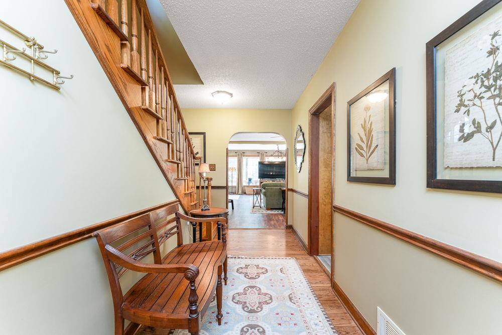 2915 Ashford Road Northeast Brookhaven, GA 30319 - Photo 36 of 60 a view of an entryway wooden floor and a rug