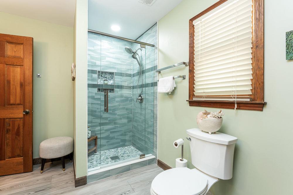 2915 Ashford Road Northeast Brookhaven, GA 30319 - Photo 58 of 60 a bathroom with a toilet and a shower
