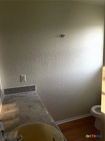 a bathroom with a toilet