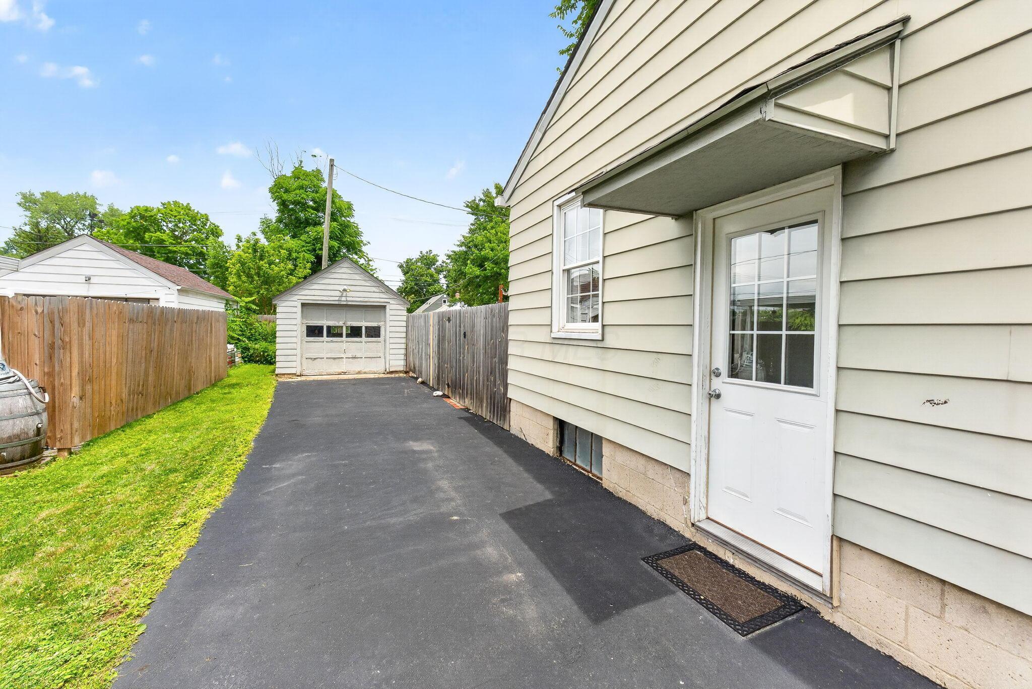 492 Wetmore Road Columbus, OH 43214 - Photo 10 of 55 Paved driveway leading to a detached garage