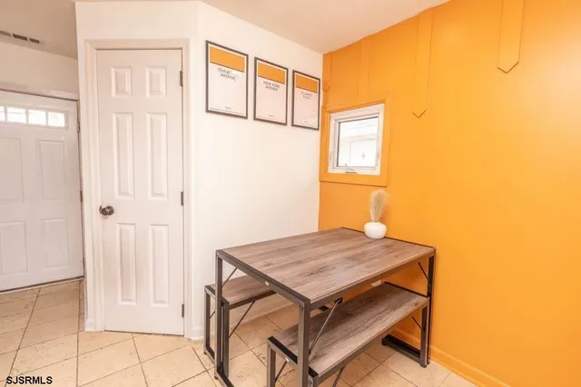 a view of two chairs in the balcony